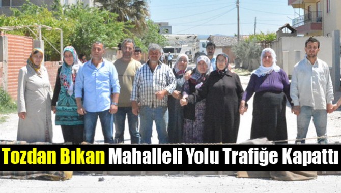 Tozdan Bıkan Mahalleli Yolu Trafiğe Kapattı